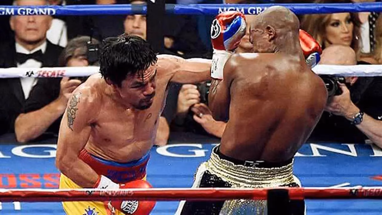 Manny Pacquiao Menggempur Floyd Mayweather